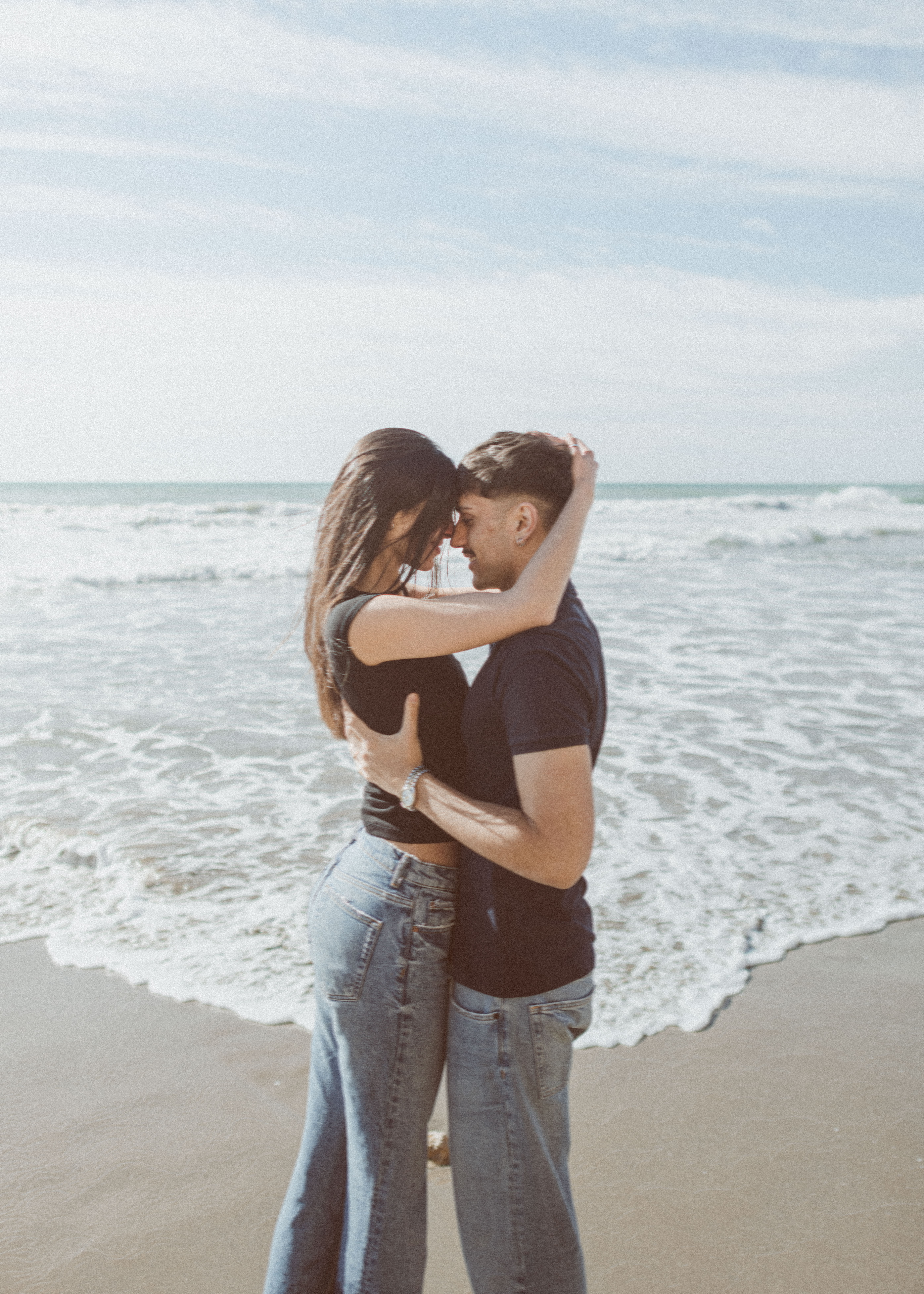 Shoreline Whispers: Artistic Beach Couple Photography in Sitges