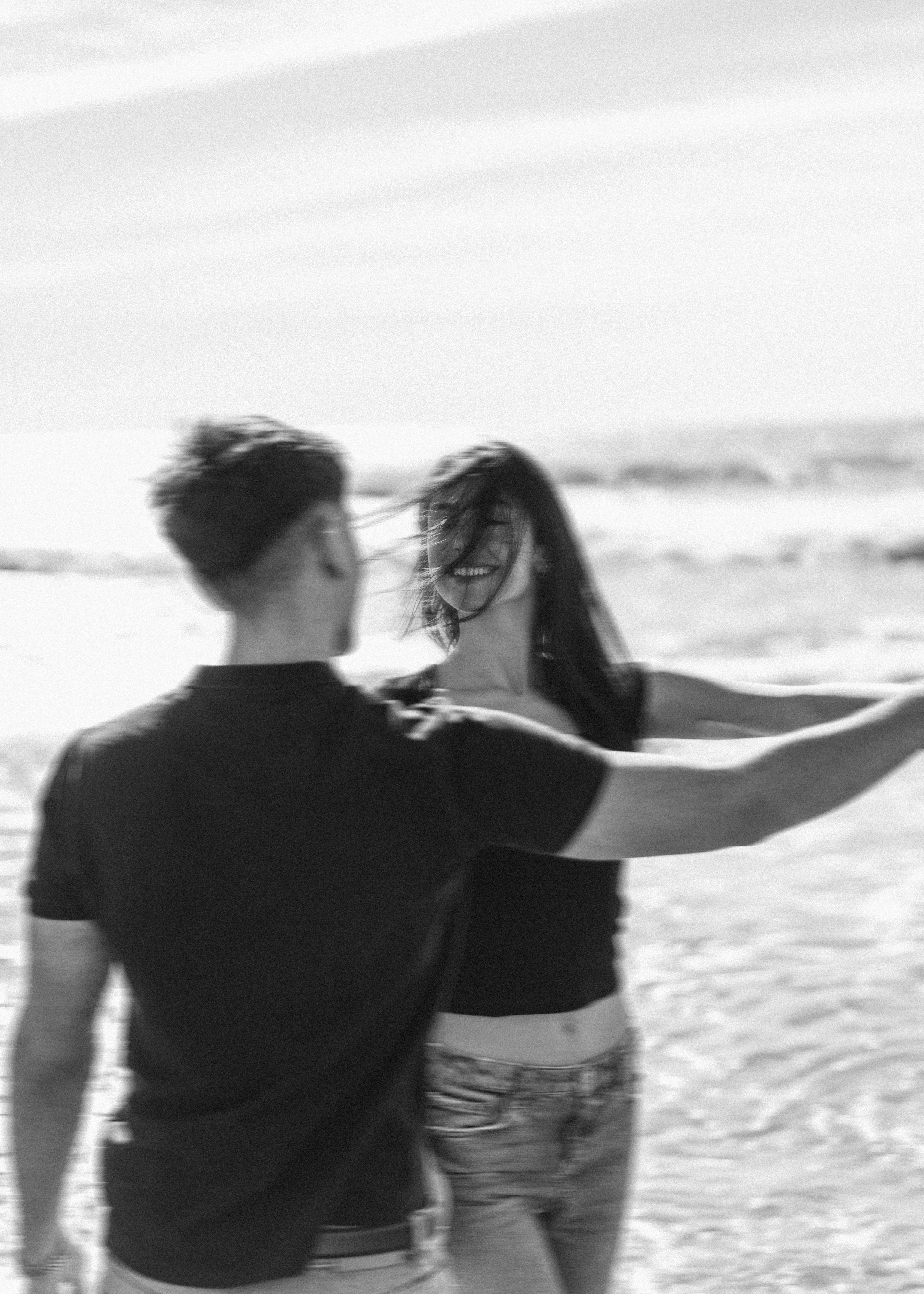 Coastal Whispers: Creative Couple Portraits by Sitges' Beaches