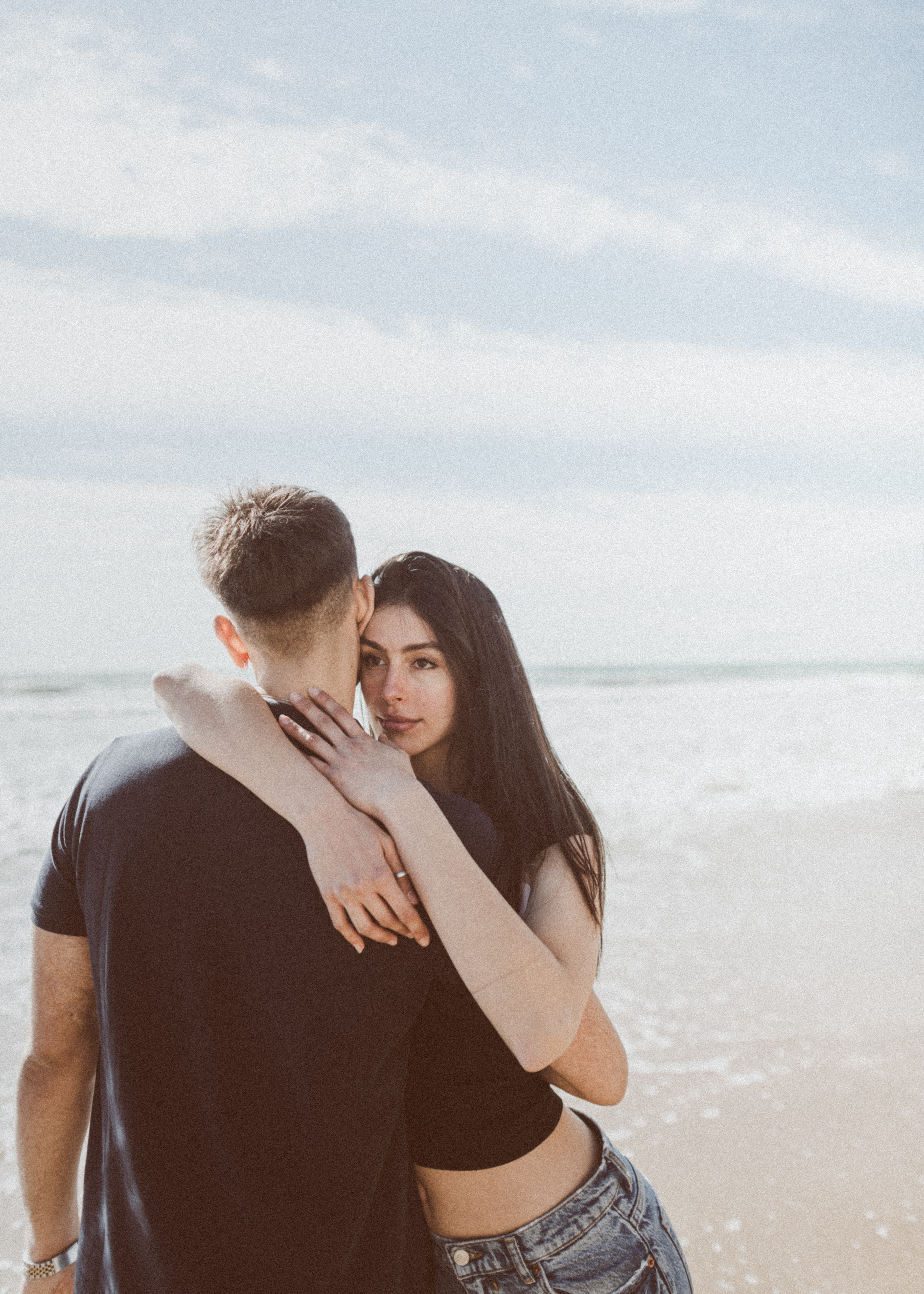Oceanic Embrace: Editorial Couple Portraits on Sitges' Beaches