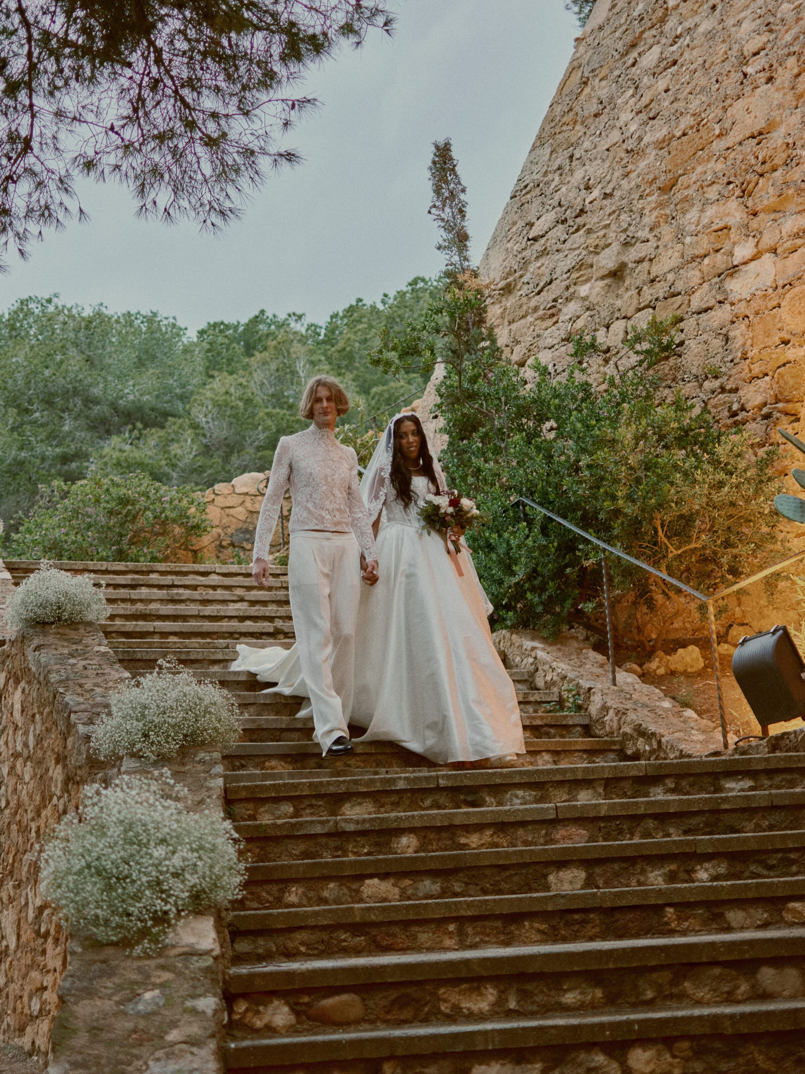 Bride walking through the forest