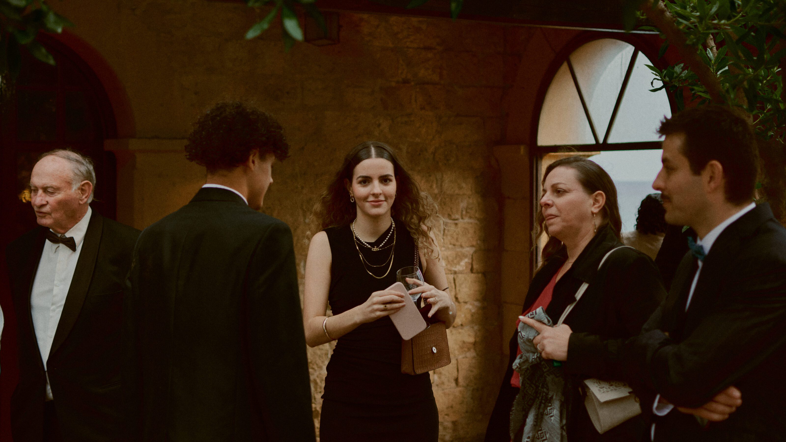 Joyful guest toasting