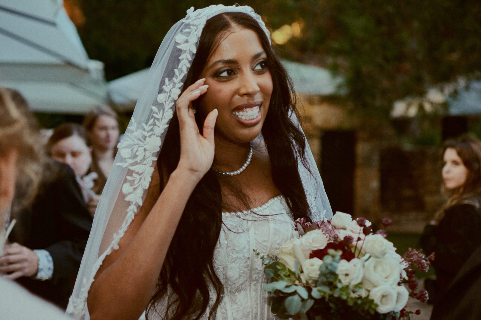 Stylish bride with flowing gown