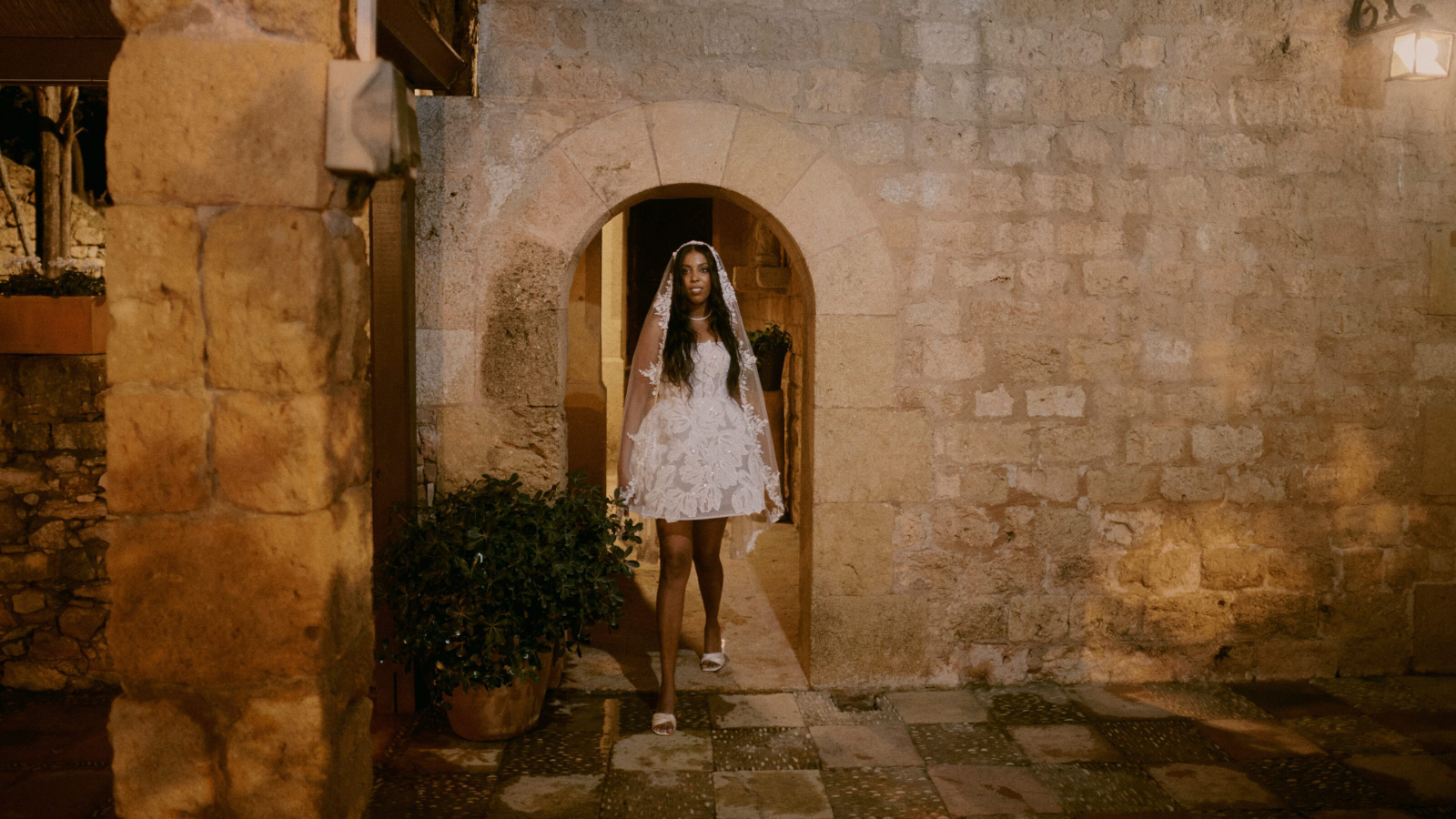 Groom holding bride’s hand