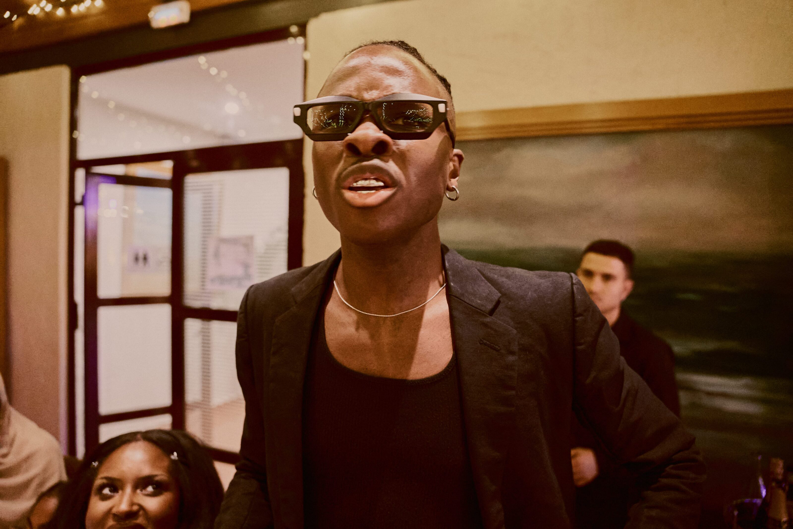 Bride adjusting her veil