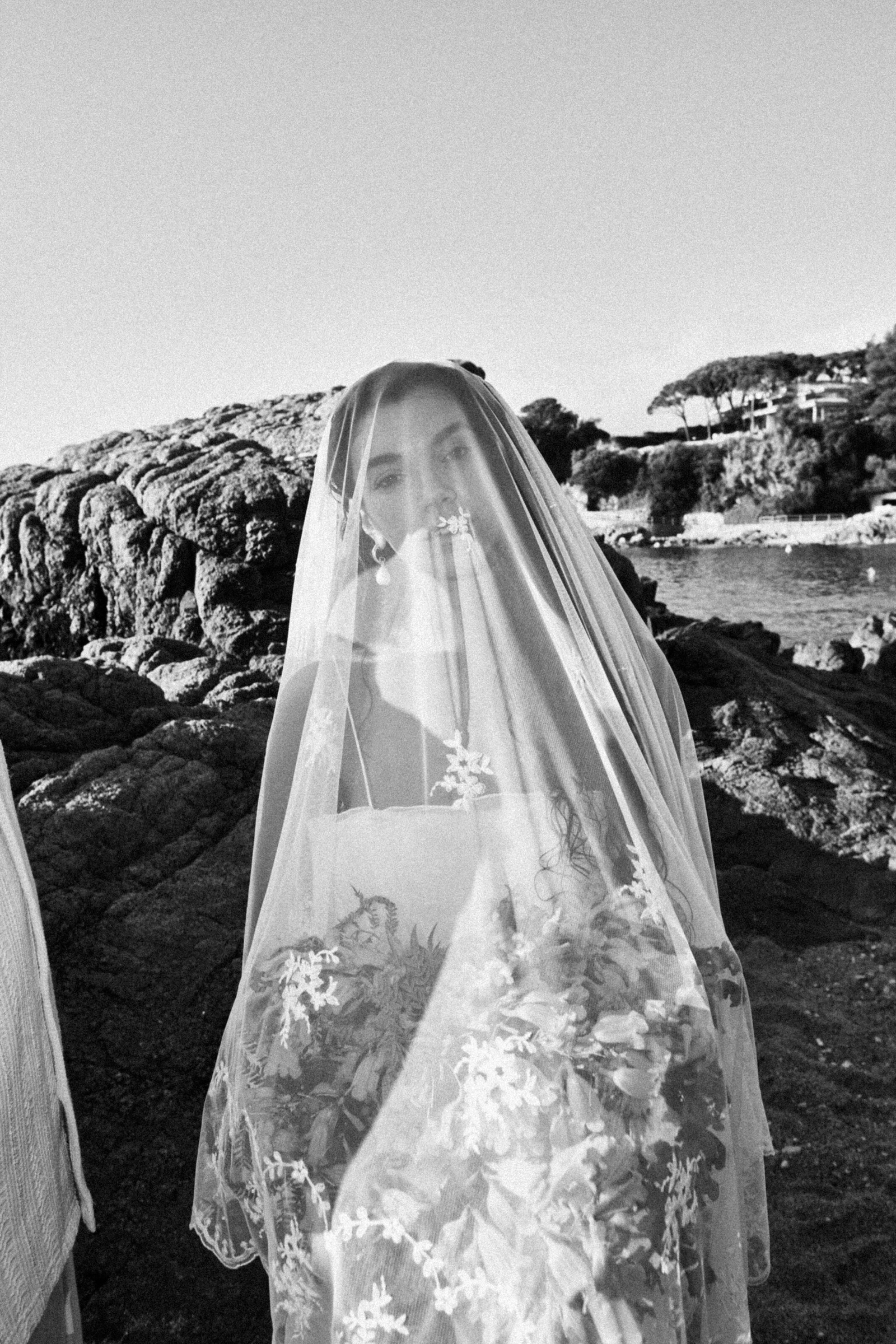 Groom holding bride close